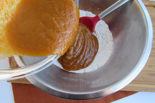 Wet and dry ingredients for pumpkin muffins.