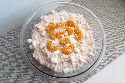 Tropical Fluff Salad - Such a quick and easy and inexpensive salad to make for a crowd. Perfect for potlucks, BBQ's and family get togethers. Coupons4Utah